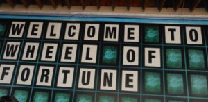 Sign saying "Welcome to Wheel of Fortune".